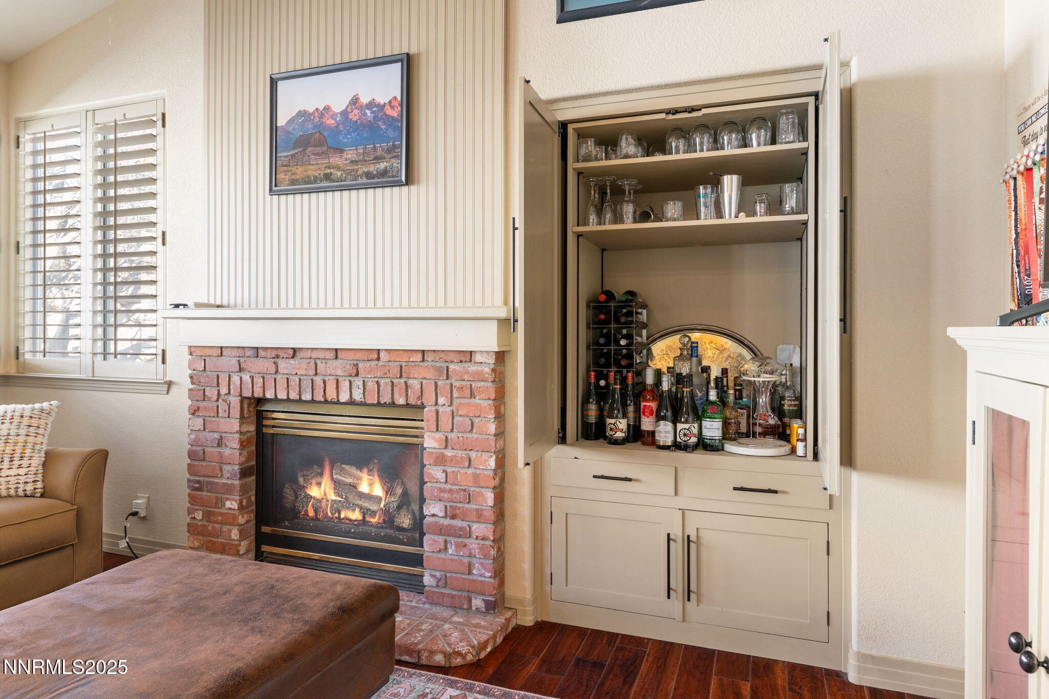 2255 Hogan Court Reno, NV 89523 - Photo 15 of 30 a living room with white cabinet and a fireplace