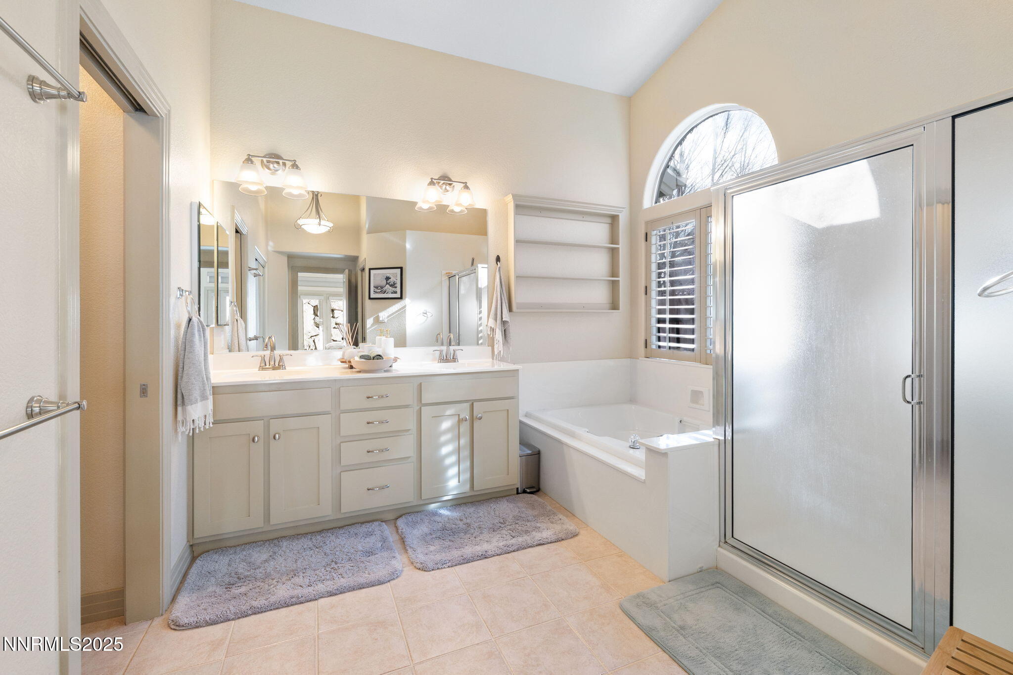 2255 Hogan Court Reno, NV 89523 - Photo 19 of 30 a bathroom with a tub sink shower and mirror