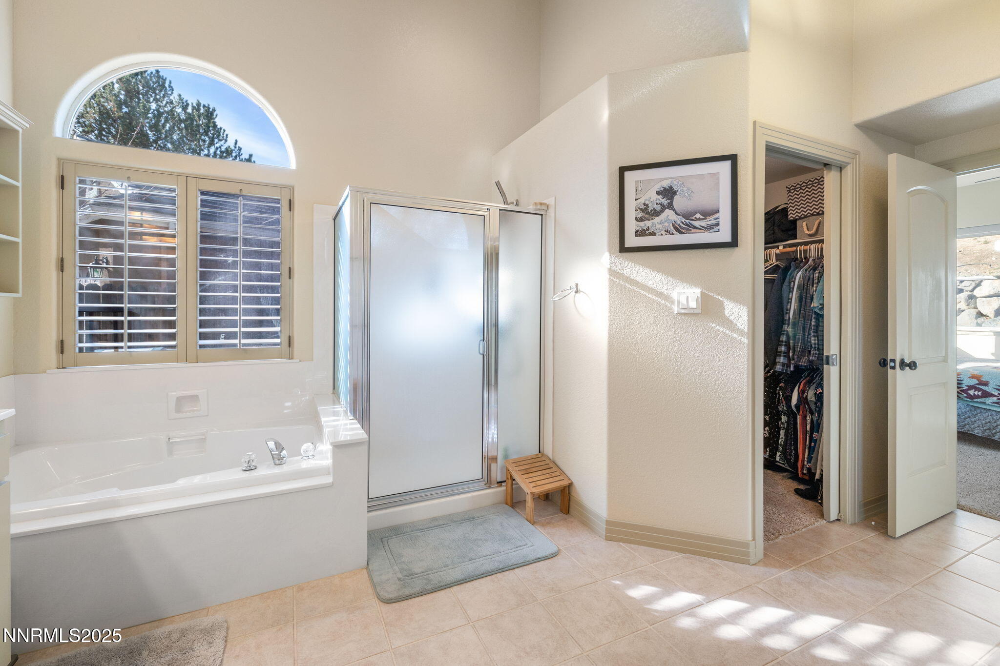 2255 Hogan Court Reno, NV 89523 - Photo 20 of 30 a spacious bathroom with a bathtub and a shower