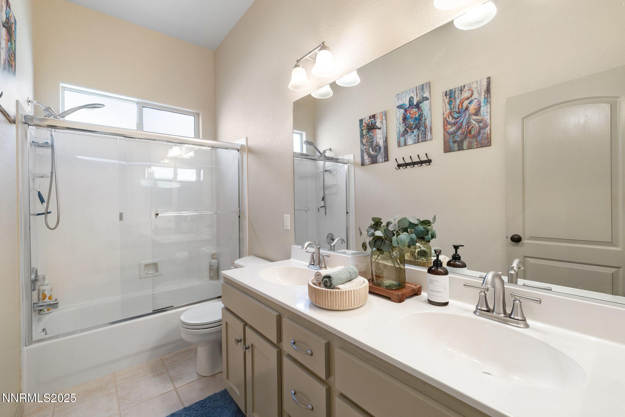 2255 Hogan Court Reno, NV 89523 - Photo 22 of 30 a bathroom with a double vanity sink toilet and shower