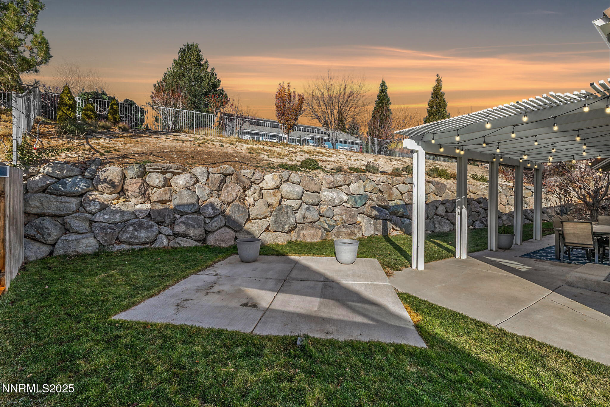 2255 Hogan Court Reno, NV 89523 - Photo 27 of 30 a view of a backyard with sitting area