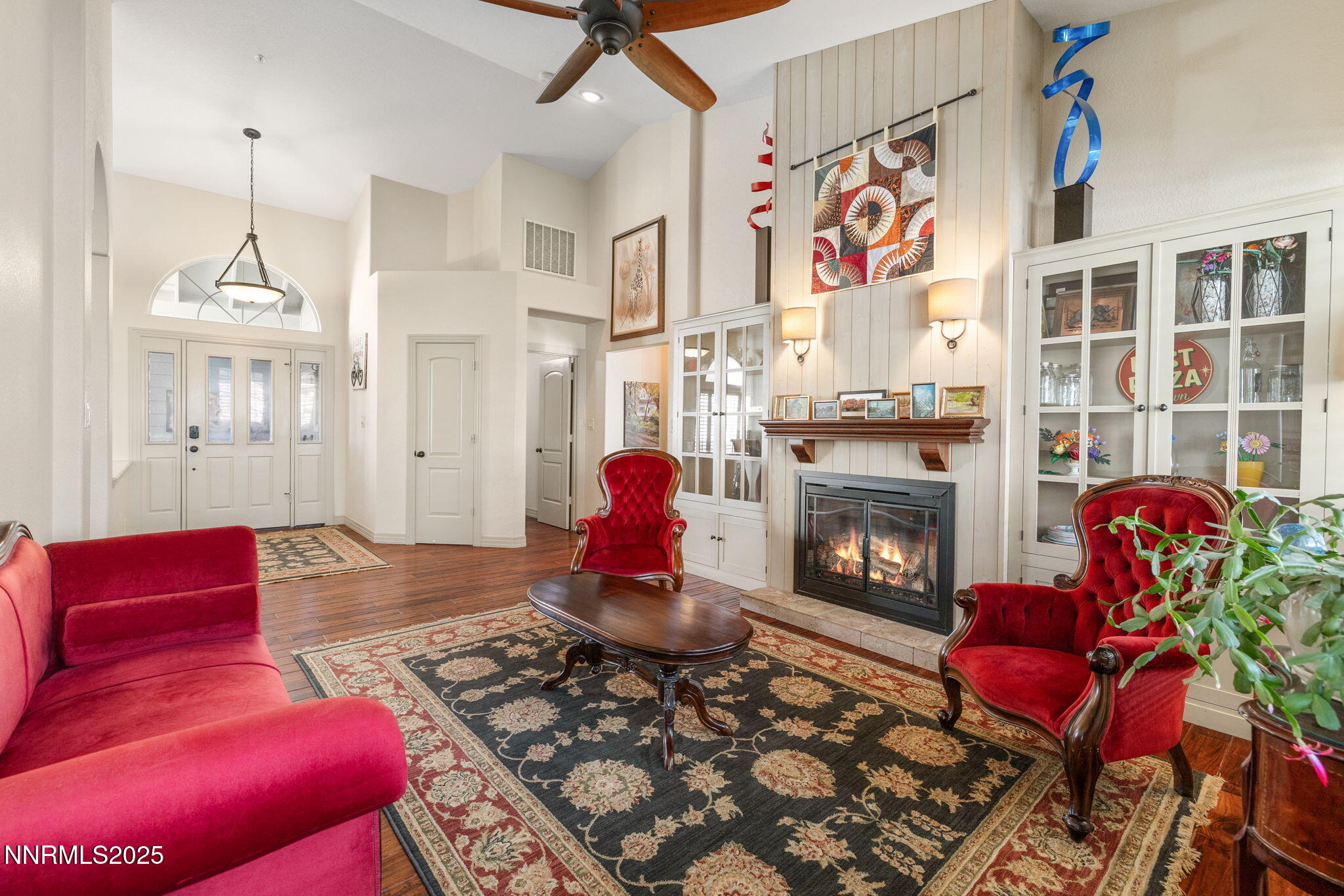 2255 Hogan Court Reno, NV 89523 - Photo 4 of 30 a living room with furniture rug and a fireplace