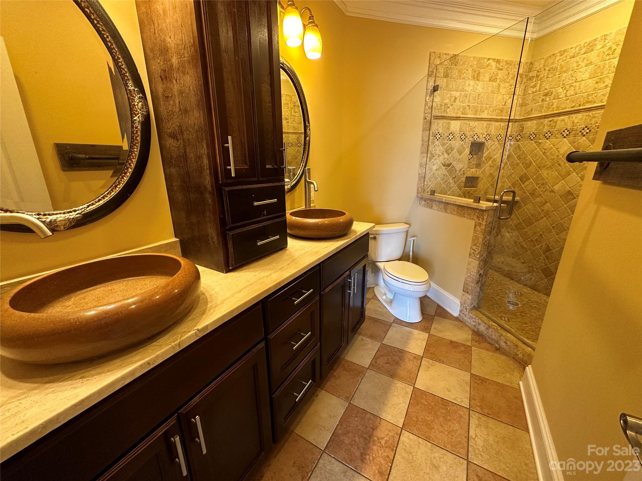1334 Torrence Circle Davidson, NC 28036 - Photo 11 of 12 a bathroom with a granite countertop sink and a mirror