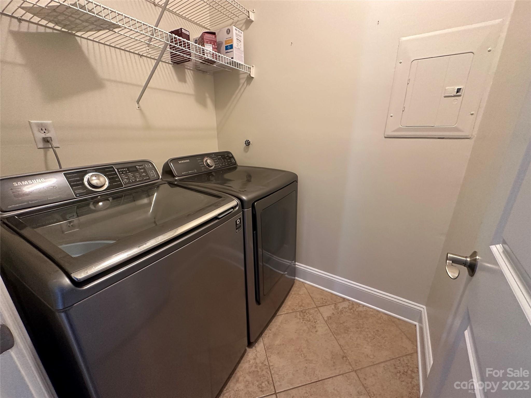 1334 Torrence Circle Davidson, NC 28036 - Photo 7 of 12 a utility room with dryer and washer