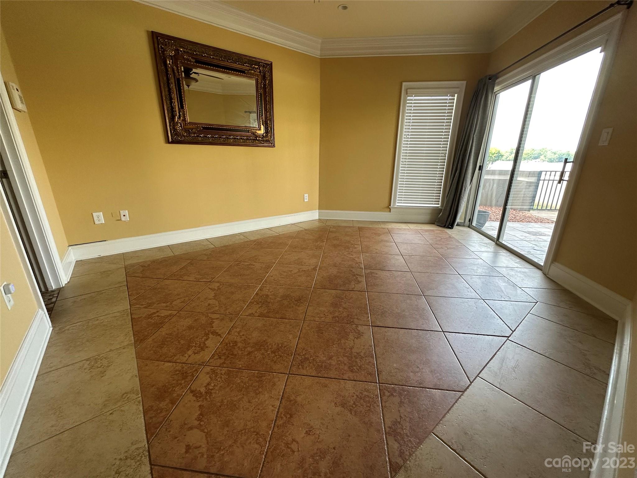 1334 Torrence Circle Davidson, NC 28036 - Photo 10 of 12 a view of an empty room and window