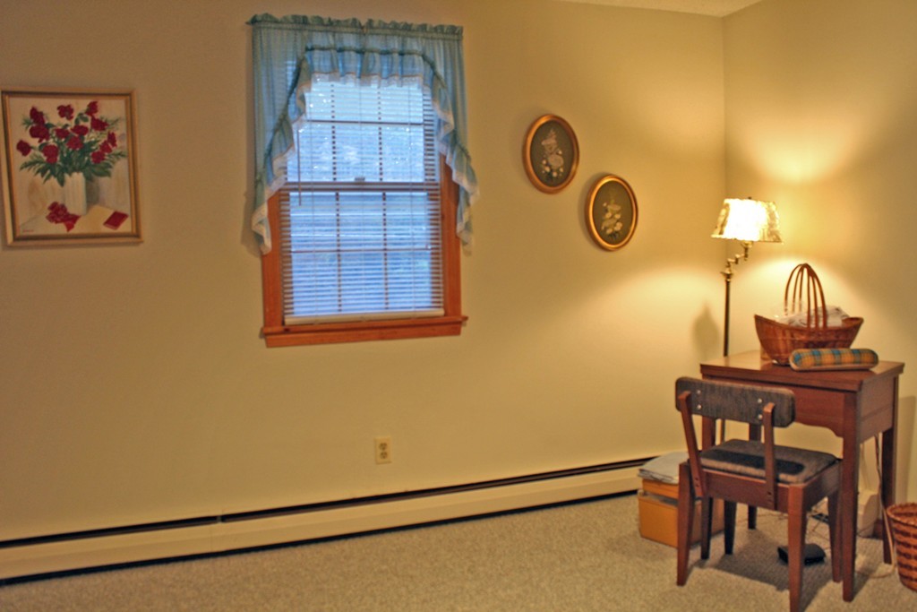 70 Buckland Road Ashfield, MA 01330 - Photo 24 of 30 a view of a door and chair in a room