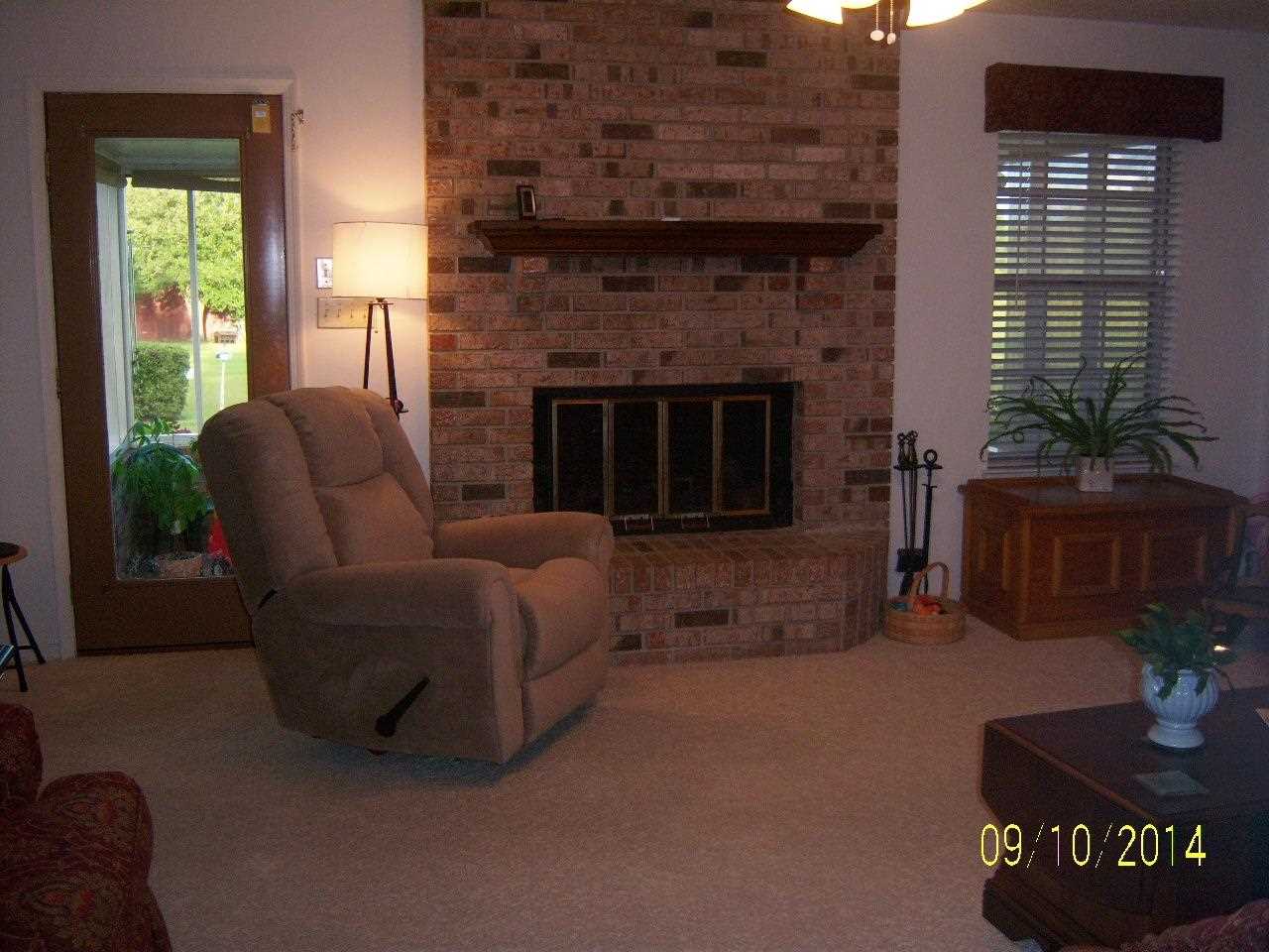 6938 East Gate Road Milton, FL 32570 - Photo 3 of 43 Family room with fireplace