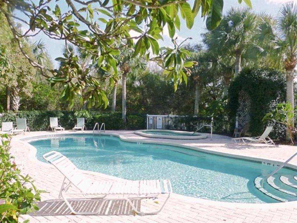 1605 Send Way Lutz, FL 33549 - Photo 23 of 24 a view of a swimming pool with a sitting area