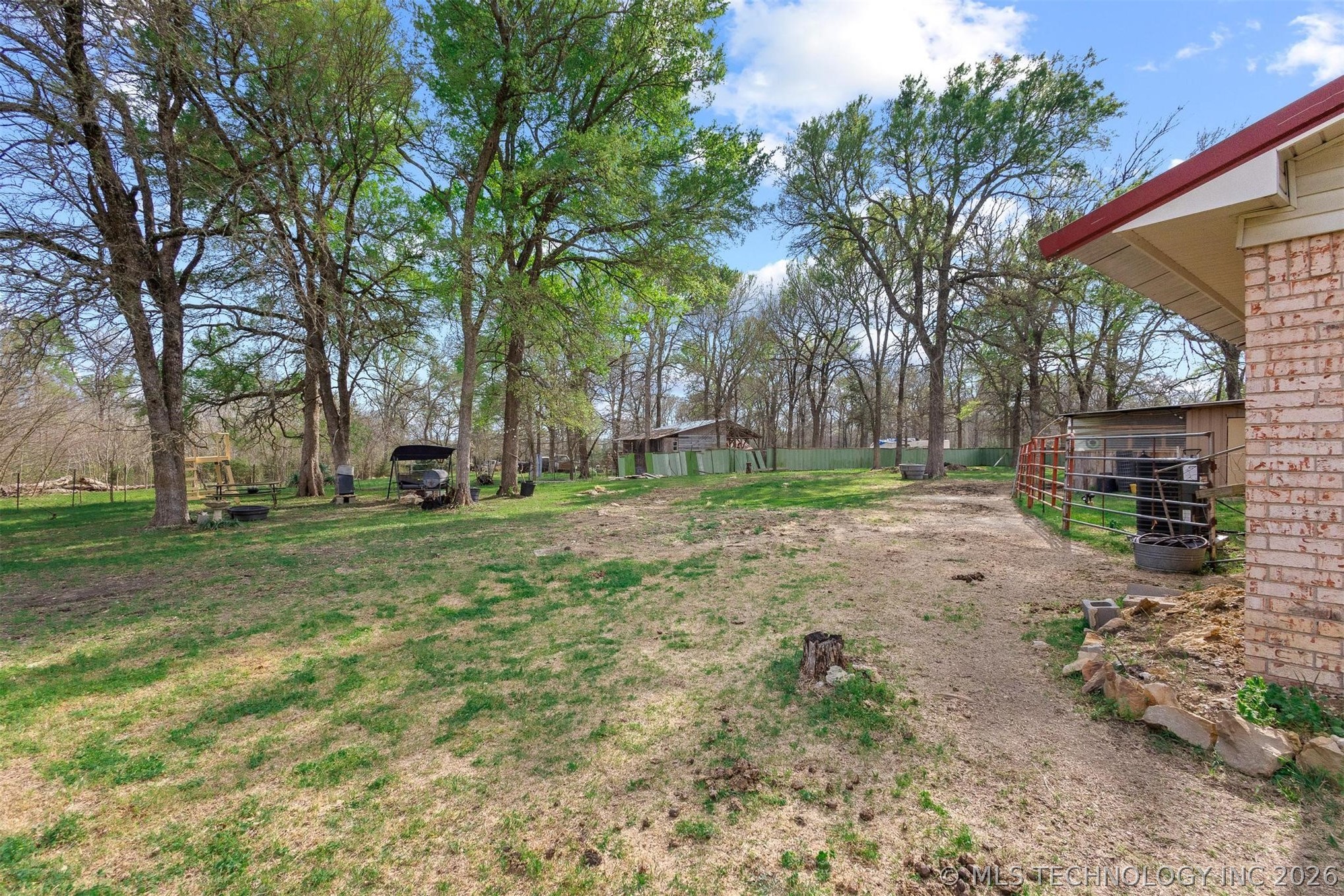 2628 East 2064 Road Hugo, OK 74743 - Photo 32 of 40 Back lot is beyond the deer stand/blind (which conveys)