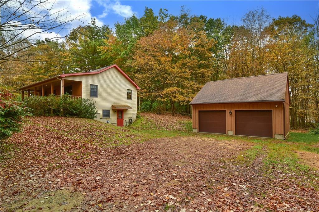 12 Skopek Road Union, CT 06076 - Photo 1 of 1 a view of a house with a yard and large tree