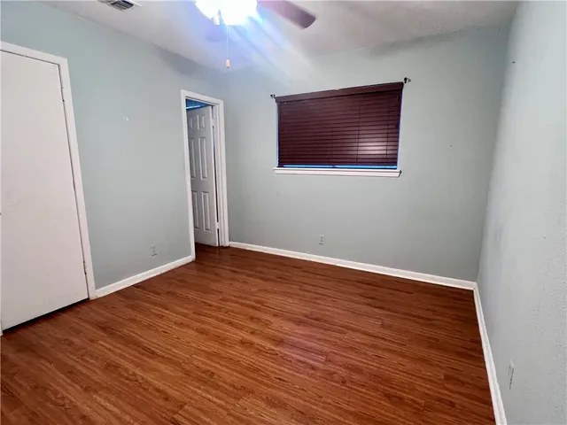 a view of storage and utility room with racks on the wall