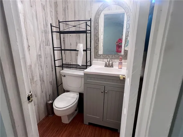 a bathroom with a toilet and a sink