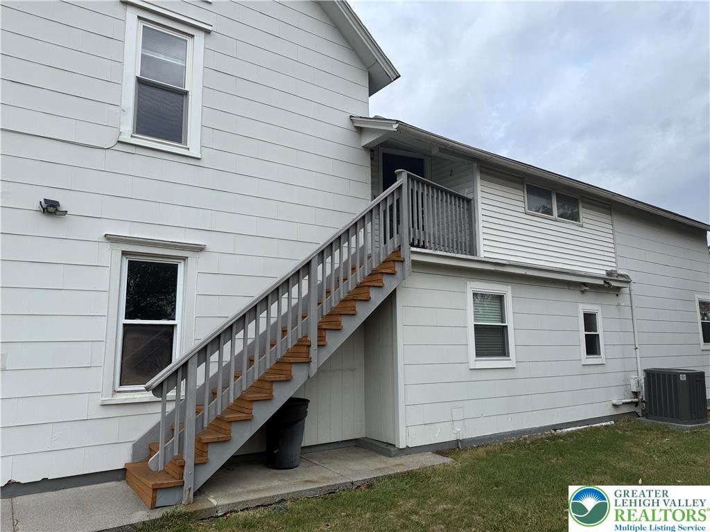 637 5th Street Whitehall, PA 18052 - Photo 1 of 16 a view of house with yard and staircase