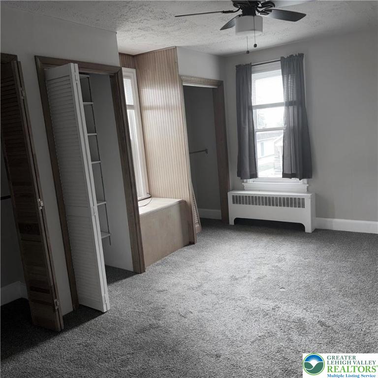 637 5th Street Whitehall, PA 18052 - Photo 11 of 16 a view of an empty room with a window