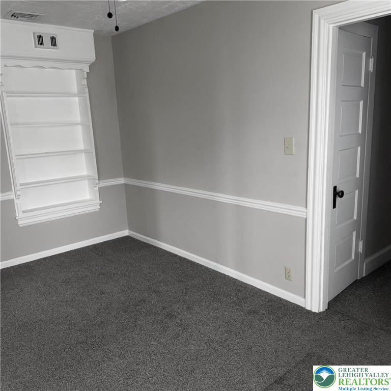 637 5th Street Whitehall, PA 18052 - Photo 12 of 16 a view of an empty room with a window