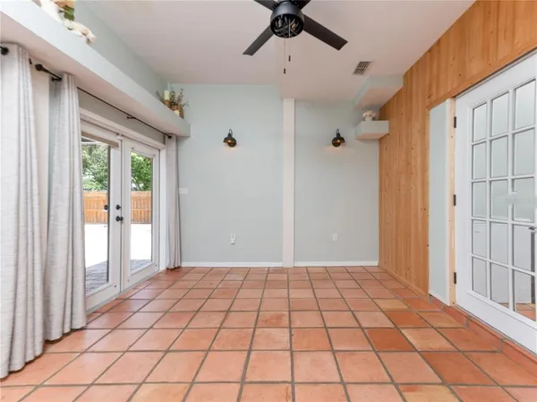 a view of an empty room and window