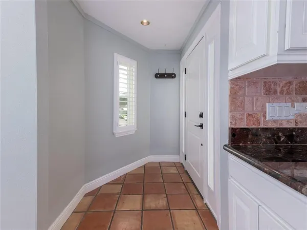 a view of a kitchen from window