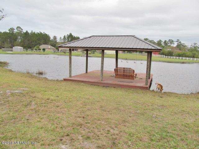 9762 Old Plank Road Jacksonville, FL 32220 - Photo 13 of 14 "SCOOTER" BY THE DOCK