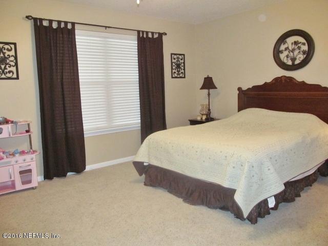 9762 Old Plank Road Jacksonville, FL 32220 - Photo 7 of 14 MASTER BEDROOM