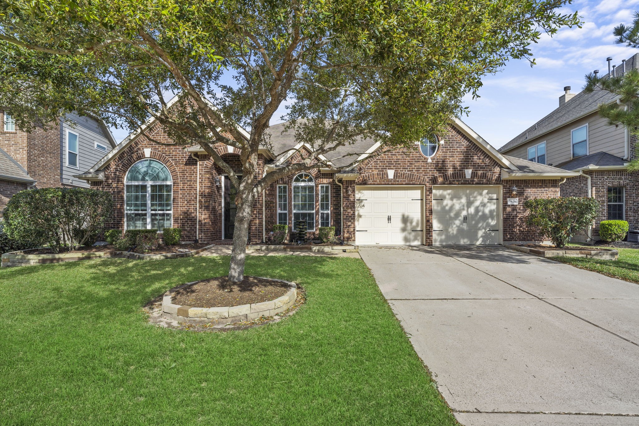 3426 Summer Ranch Drive Katy, TX 77494 - Photo 36 of 48 A beautifully maintained front exterior welcomes you home with mature trees, manicured landscaping, and timeless curb appeal.