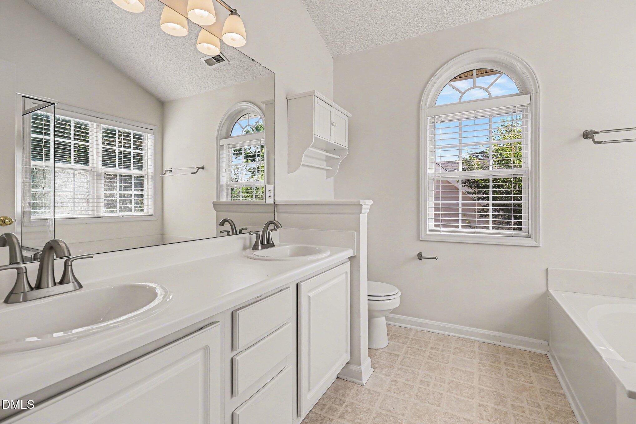 8709 Blakehurst Drive Raleigh, NC 27617 - Photo 18 of 41 Primary Bathroom