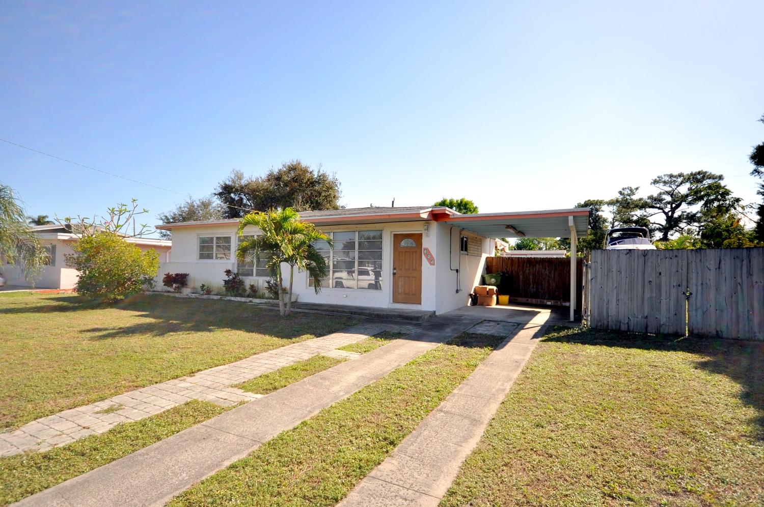 345 Winged Foot Road Palm Springs, FL 33461 - Photo 1 of 12 Great carport
