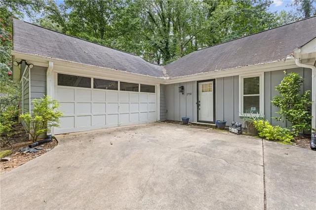 a view of a house with a garage