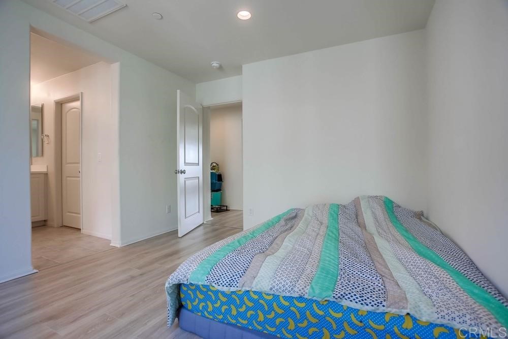 2229 Solara Lane Vista, CA 92081 - Photo 14 of 25 a view of room with wooden floor