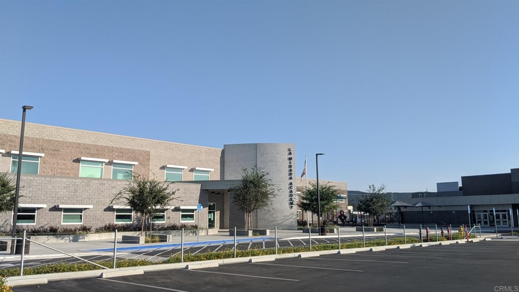 2229 Solara Lane Vista, CA 92081 - Photo 23 of 25 a view of a building with street view