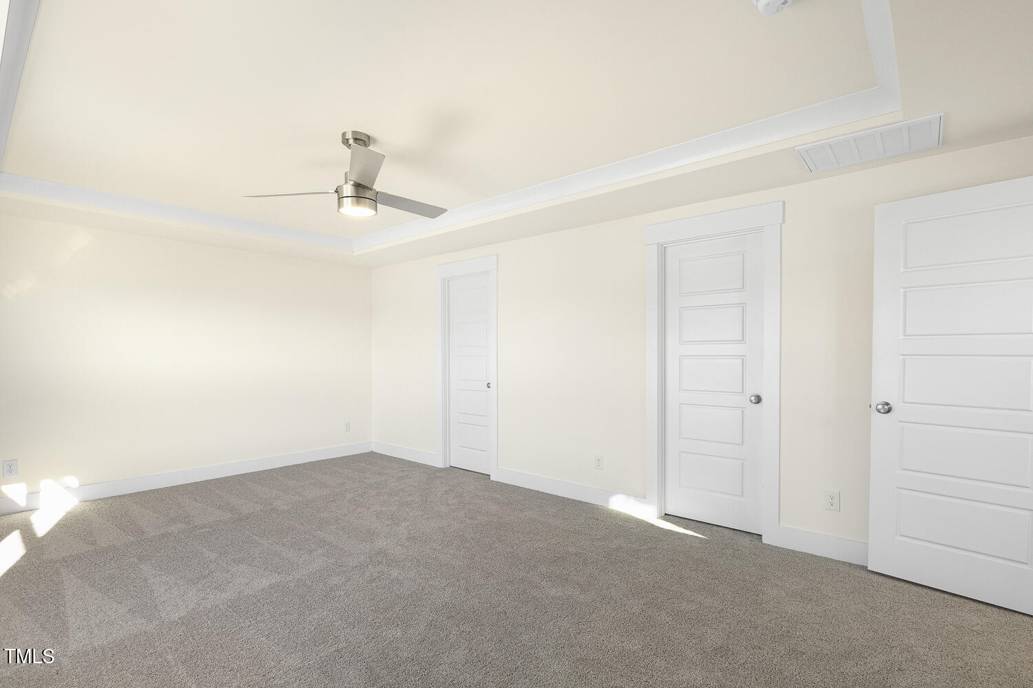 82 Gander Drive Benson, NC 27504 - Photo 14 of 33 a view of a room with a ceiling fan and carpet