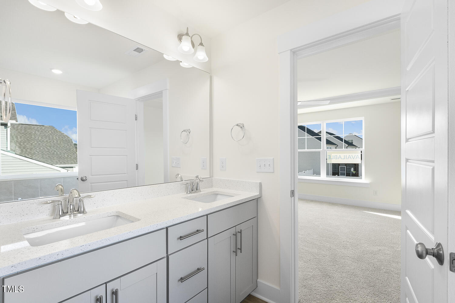 82 Gander Drive Benson, NC 27504 - Photo 15 of 33 a bathroom with a sink double vanity and a mirror