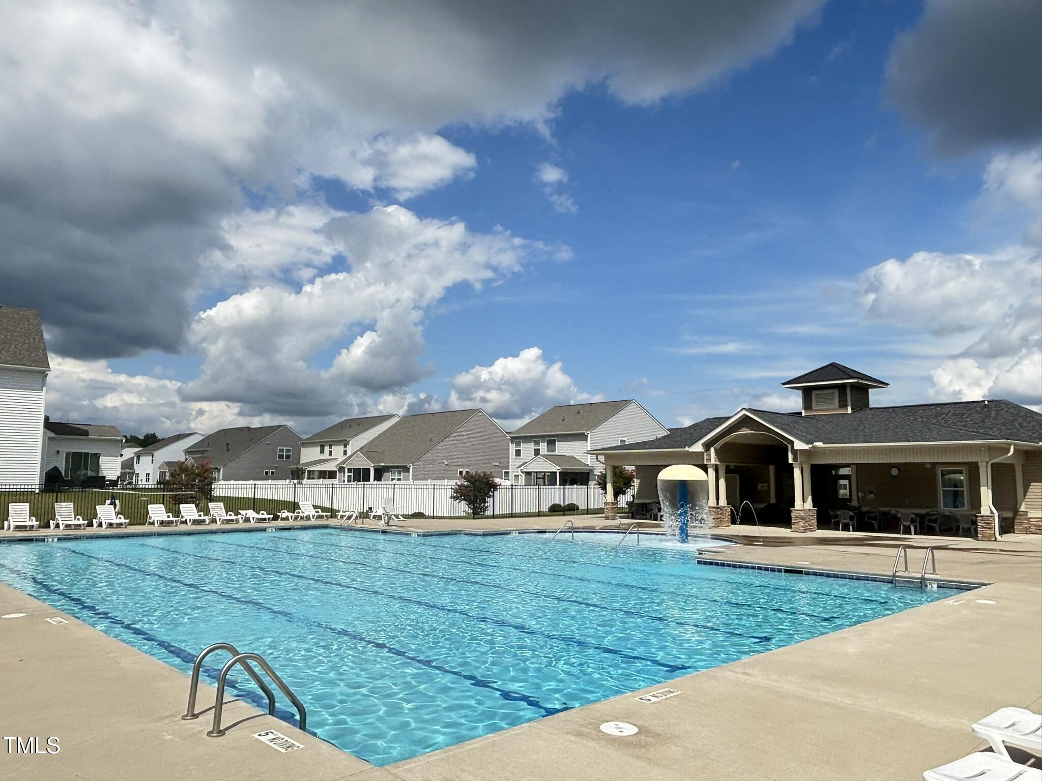 82 Gander Drive Benson, NC 27504 - Photo 31 of 33 a front view of a house with garden