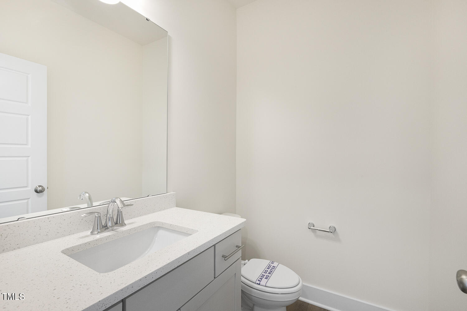 82 Gander Drive Benson, NC 27504 - Photo 5 of 33 a bathroom with a sink a toilet and mirror
