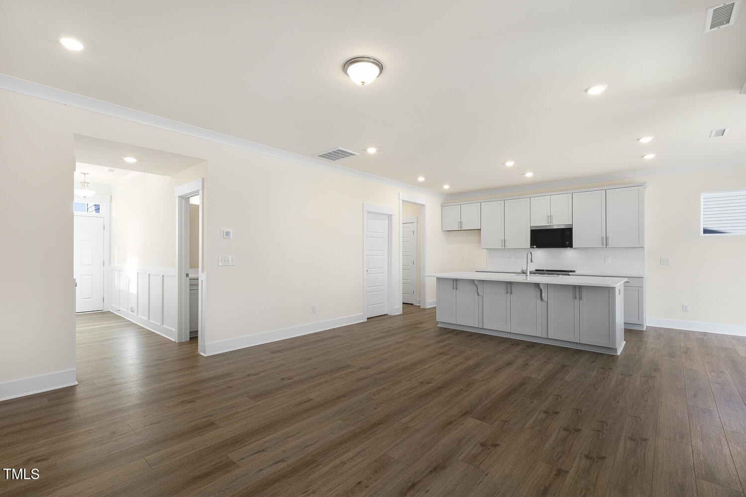 82 Gander Drive Benson, NC 27504 - Photo 7 of 33 a view of kitchen with cabinets and wooden floor