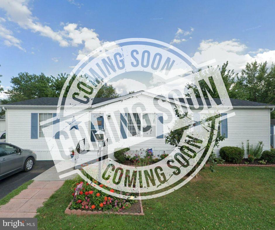 Charming home with inviting curb appeal.