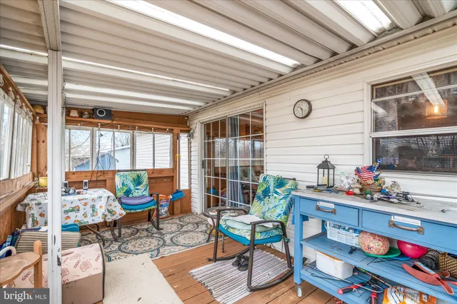 a backyard of a house with seating space