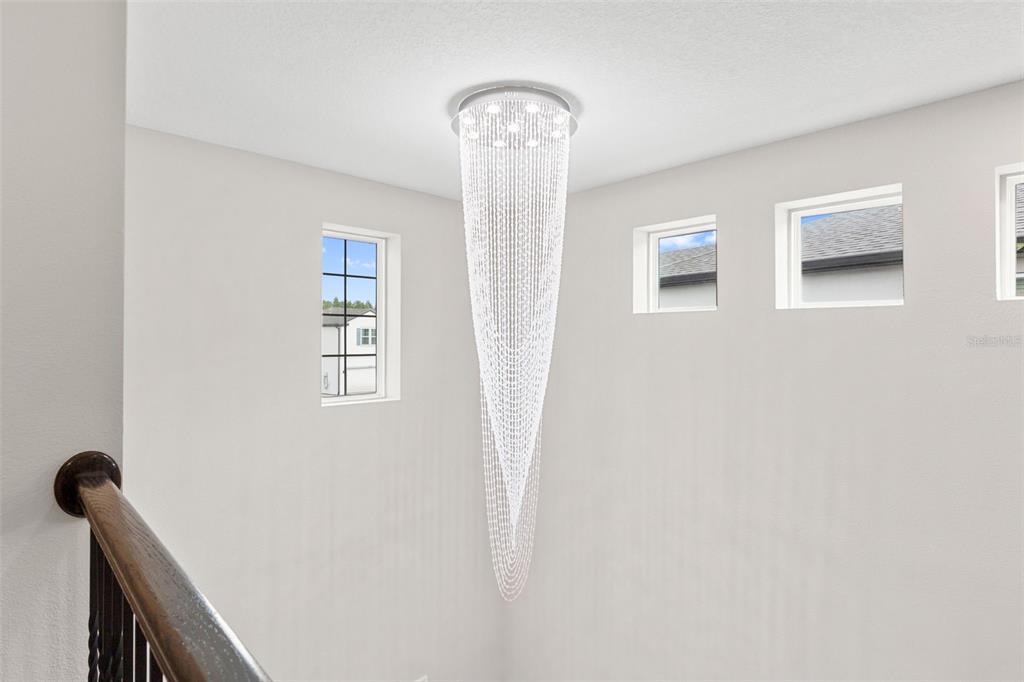 7537 Pool Compass Loop Wesley Chapel, FL 33545 - Photo 24 of 50 a view of entryway with kitchen