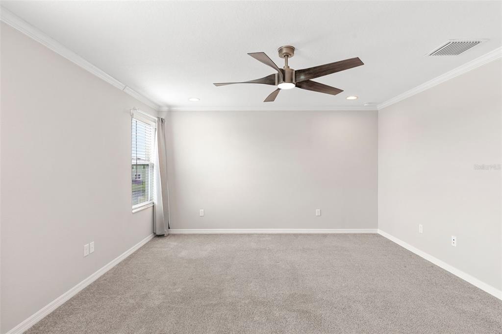 7537 Pool Compass Loop Wesley Chapel, FL 33545 - Photo 32 of 50 a view of an empty room