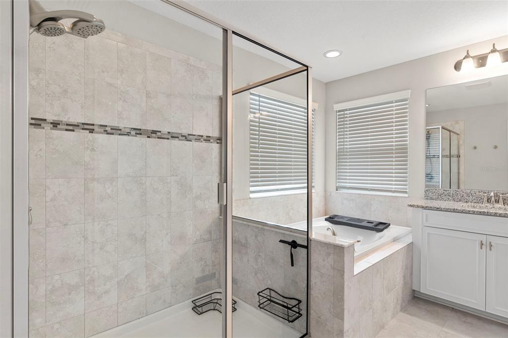 7537 Pool Compass Loop Wesley Chapel, FL 33545 - Photo 36 of 50 a kitchen with a cabinets and white appliances