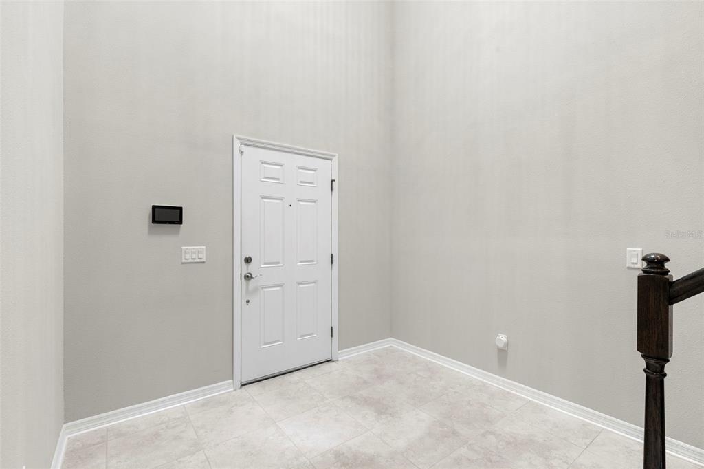 7537 Pool Compass Loop Wesley Chapel, FL 33545 - Photo 5 of 50 a view of an empty room