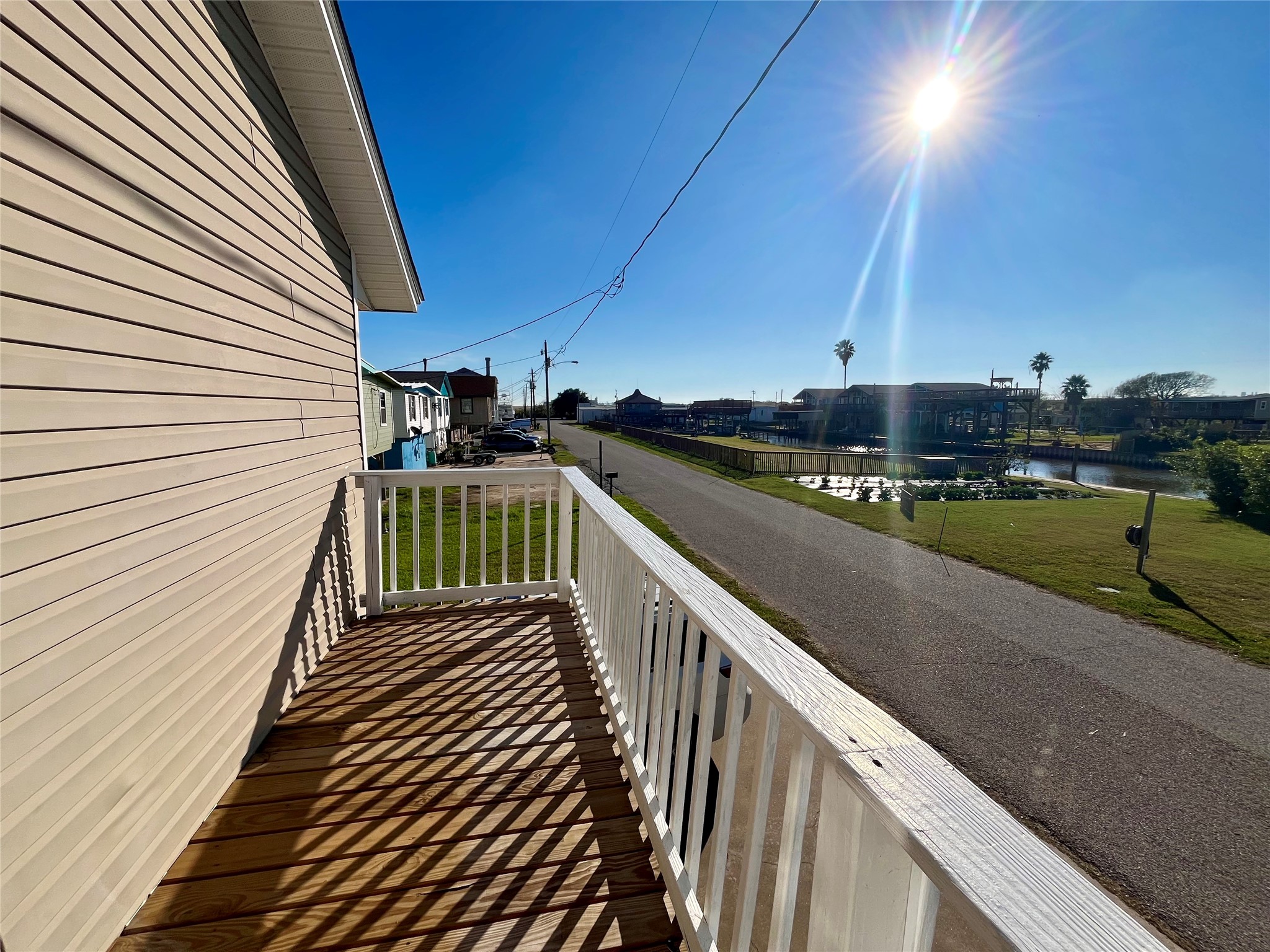 318 Marine Way Freeport, TX 77541 - Photo 15 of 20 a view of a balcony with wooden floor
