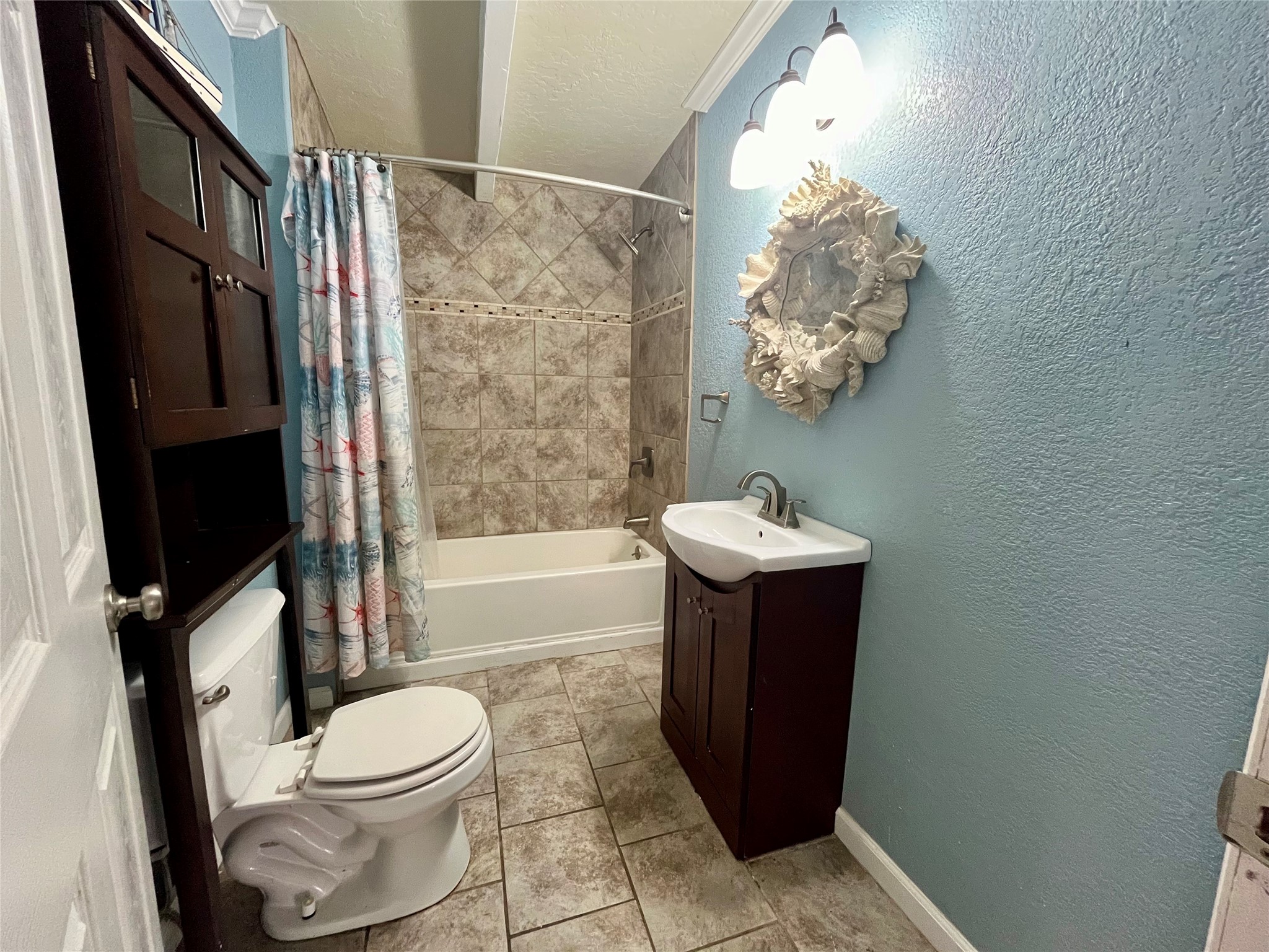 318 Marine Way Freeport, TX 77541 - Photo 6 of 20 a bathroom with a sink toilet and shower