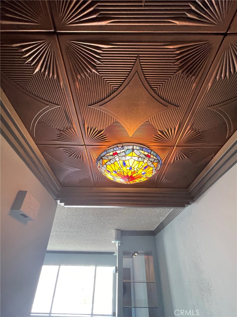 1187 East 3rd Street, Unit 209 Long Beach, CA 90802 - Photo 18 of 34 COFFERED CEILING AT ENTRANCE WITH TIFFANY STYLED FIXTURE