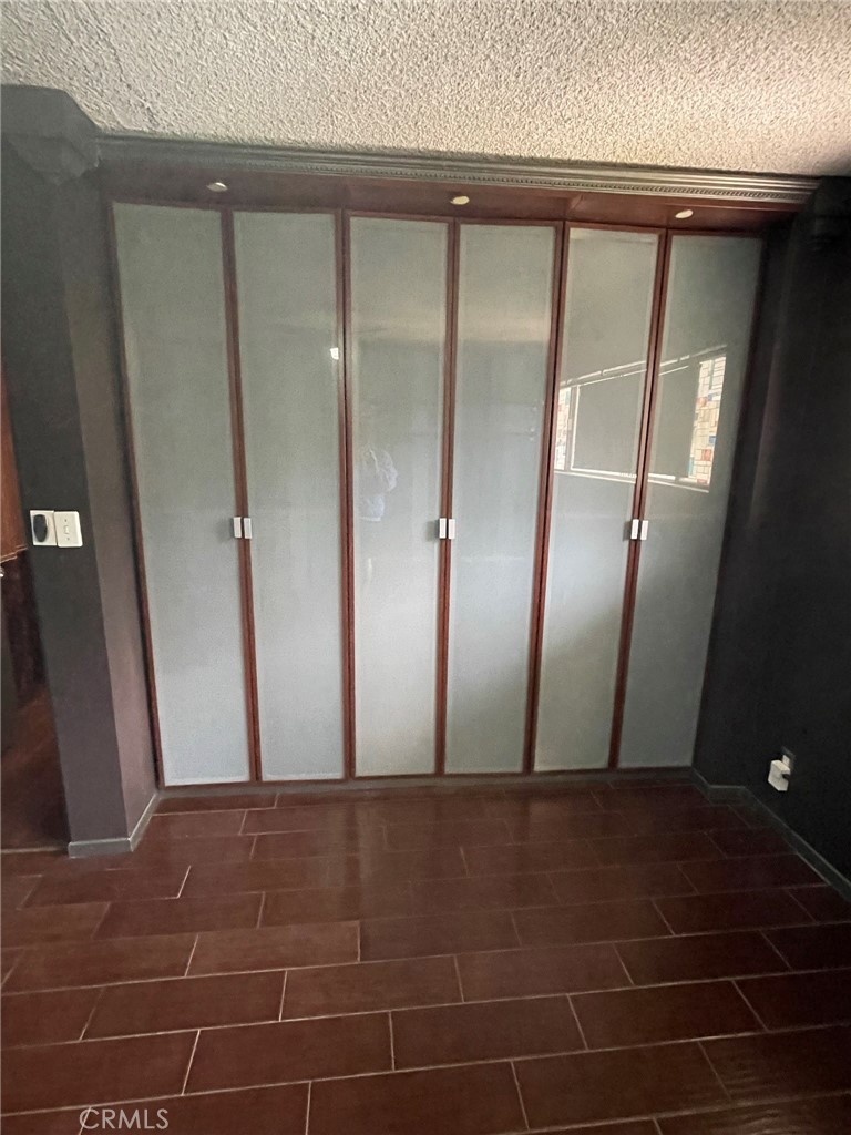 1187 East 3rd Street, Unit 209 Long Beach, CA 90802 - Photo 22 of 34 BEDROOM CLOSET DOORS CLOSED