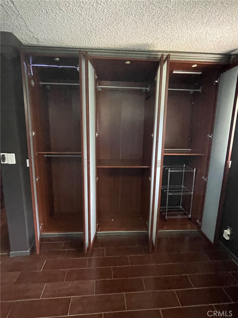 1187 East 3rd Street, Unit 209 Long Beach, CA 90802 - Photo 23 of 34 BEDROOM CLOSET DOORS OPEN