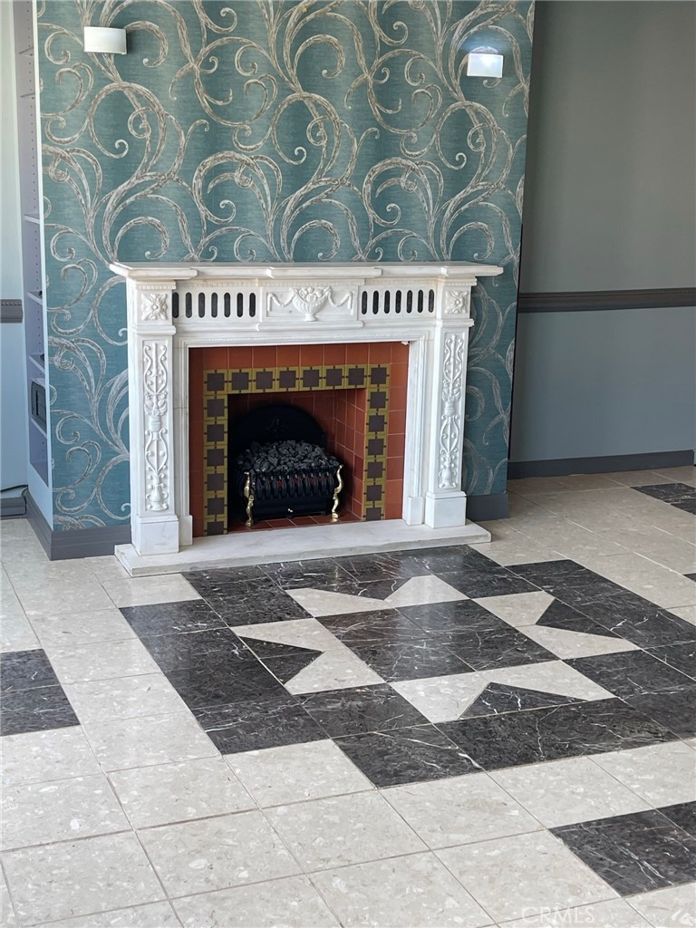 1187 East 3rd Street, Unit 209 Long Beach, CA 90802 - Photo 28 of 34 LIVING ROOM FAUX FIREPLACE