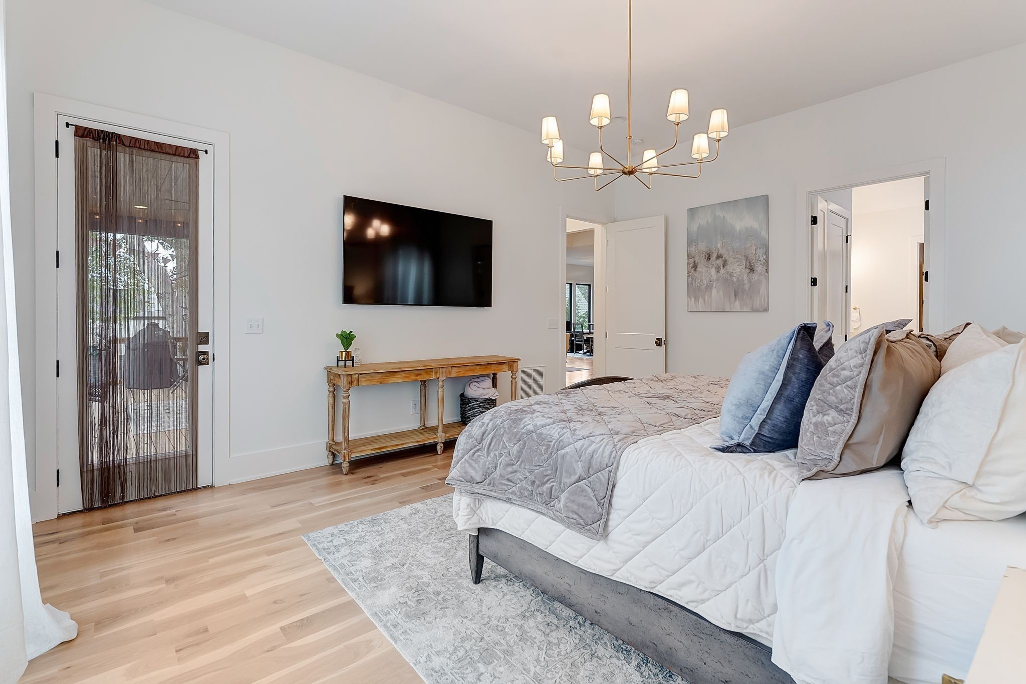 3733 Estes Road Nashville, TN 37215 - Photo 14 of 40 a bedroom with a bed and a flat screen tv