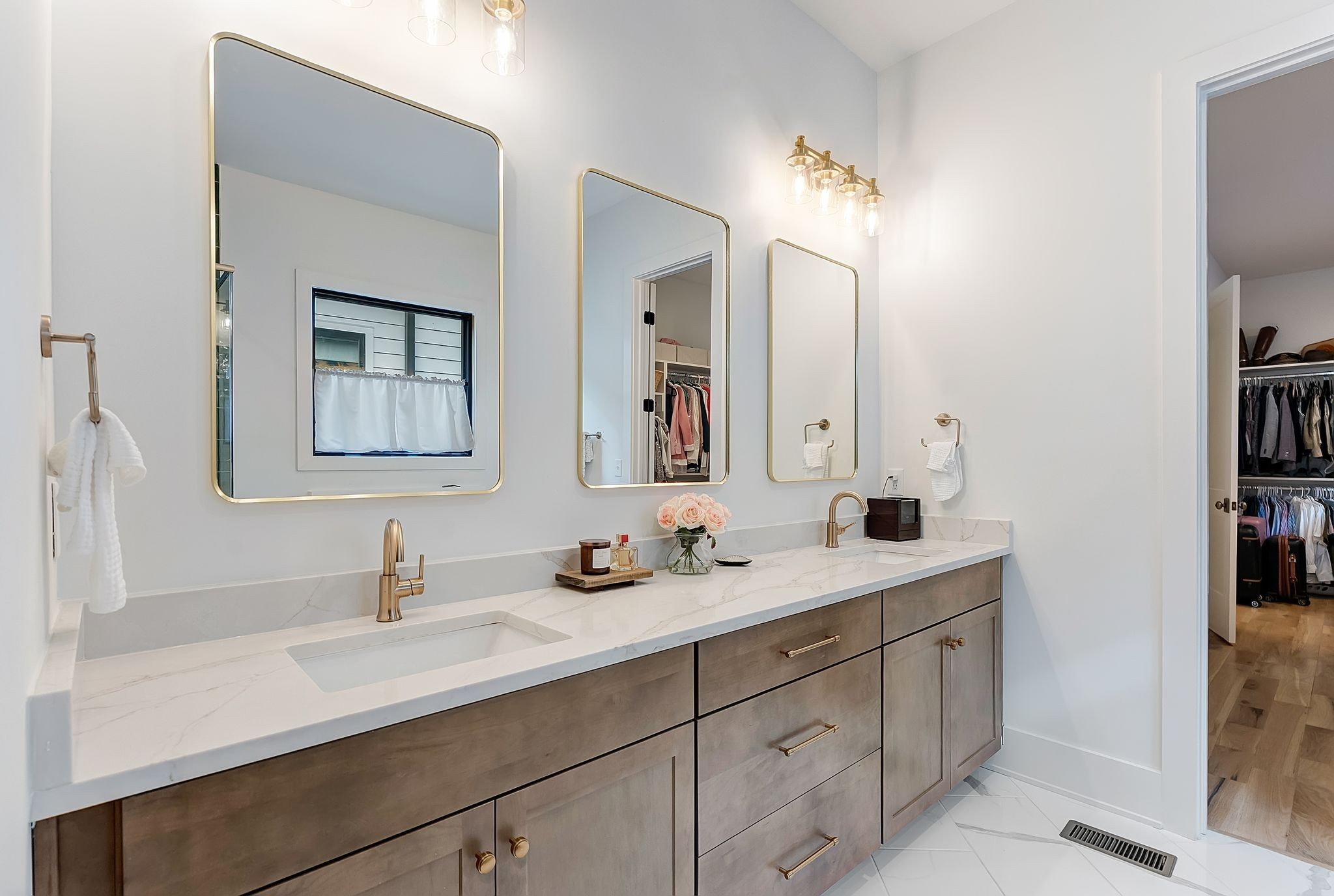 3733 Estes Road Nashville, TN 37215 - Photo 15 of 40 a bathroom with a double vanity sink and a mirror