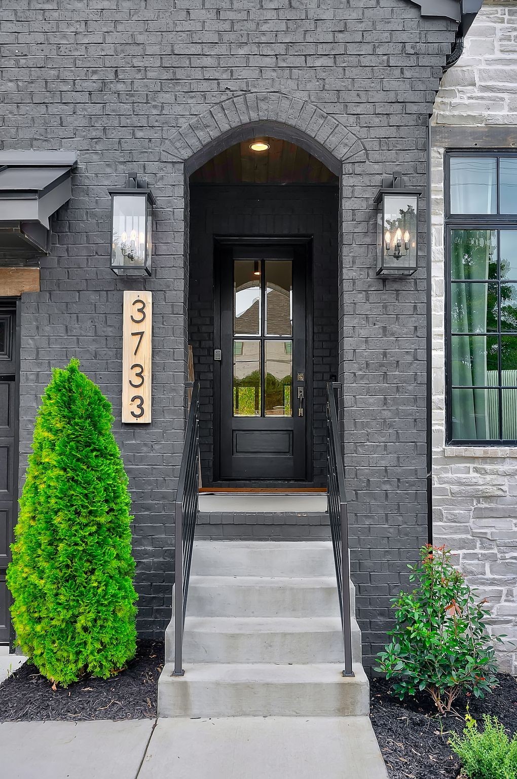 3733 Estes Road Nashville, TN 37215 - Photo 2 of 40 a front view of a house with a garden