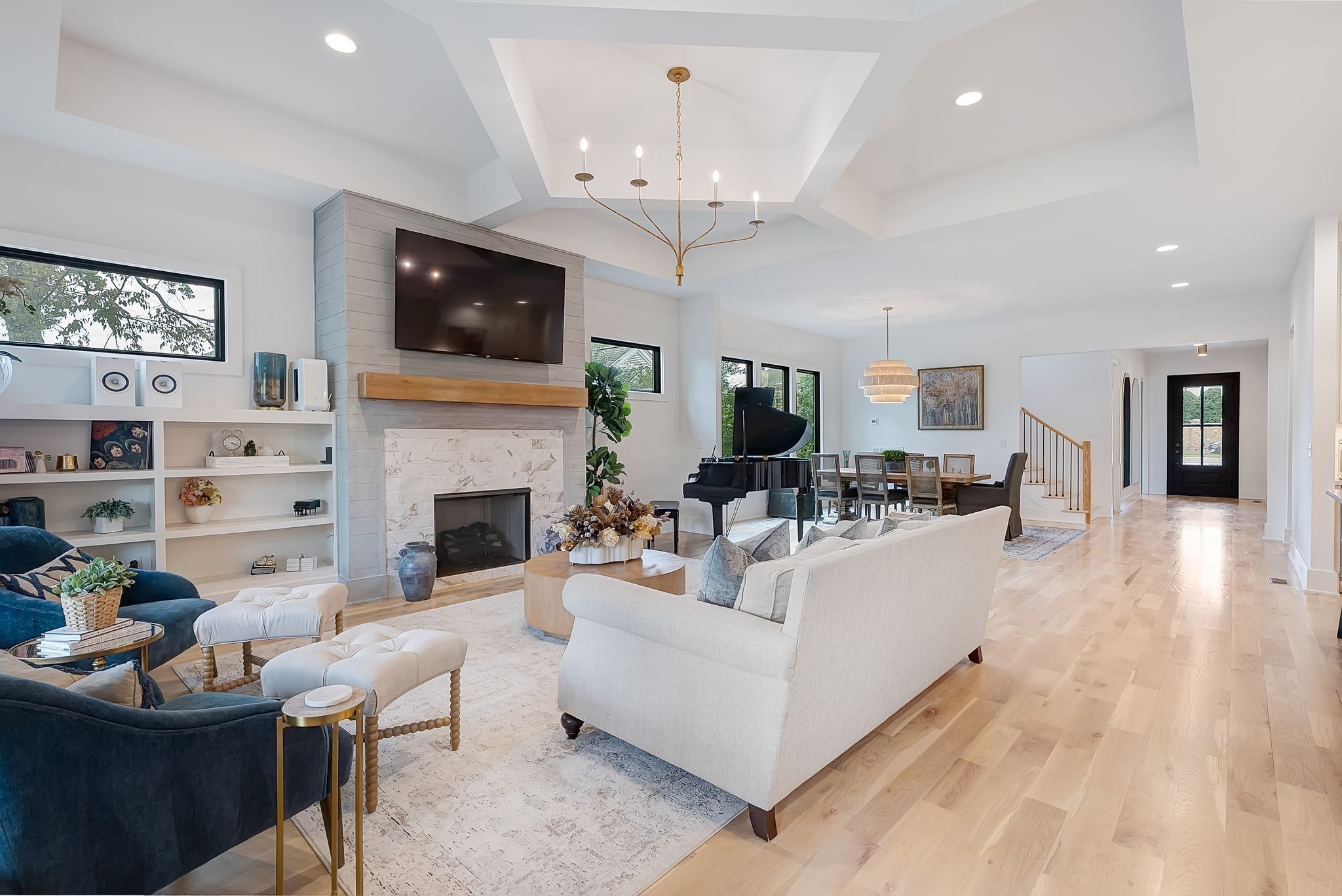 3733 Estes Road Nashville, TN 37215 - Photo 23 of 40 a living room with furniture a fireplace and a flat screen tv